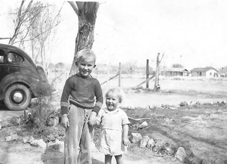 An old photo of a person

Description automatically generated